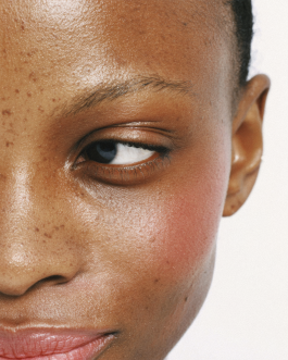 Close-up portrait exploring expression and skin texture, captured through contemporary photography and experimental visual art by IMPROMPTU studio.