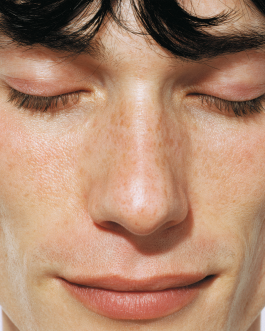 Close-up portrait exploring expression and skin texture, captured through contemporary photography and experimental visual art by IMPROMPTU studio.