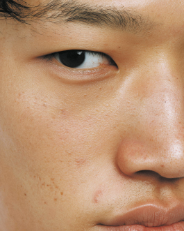 Close-up portrait exploring expression and skin texture, captured through contemporary photography and experimental visual art by IMPROMPTU studio. 