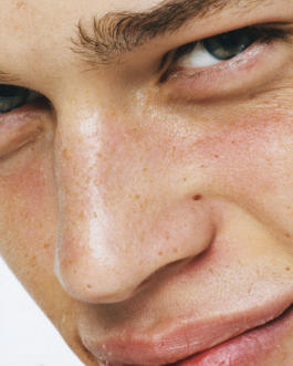 Close-up portrait exploring expression and skin texture, captured through contemporary photography and experimental visual art by IMPROMPTU studio.