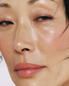 Close-up portrait exploring expression and skin texture, captured through contemporary photography and experimental visual art by IMPROMPTU studio. 