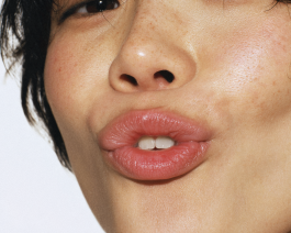 Close-up portrait exploring expression and skin texture, captured through contemporary photography and experimental visual art by IMPROMPTU studio. 