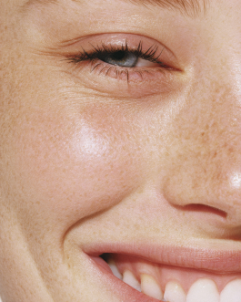 Close-up portrait exploring expression and skin texture, captured through contemporary photography and experimental visual art by IMPROMPTU studio.