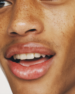 Close-up portrait exploring expression and skin texture, captured through contemporary photography and experimental visual art by IMPROMPTU studio.