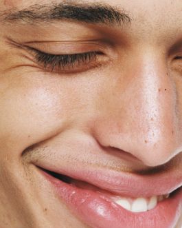 Close-up portrait exploring expression and skin texture, captured through contemporary photography and experimental visual art by IMPROMPTU studio.